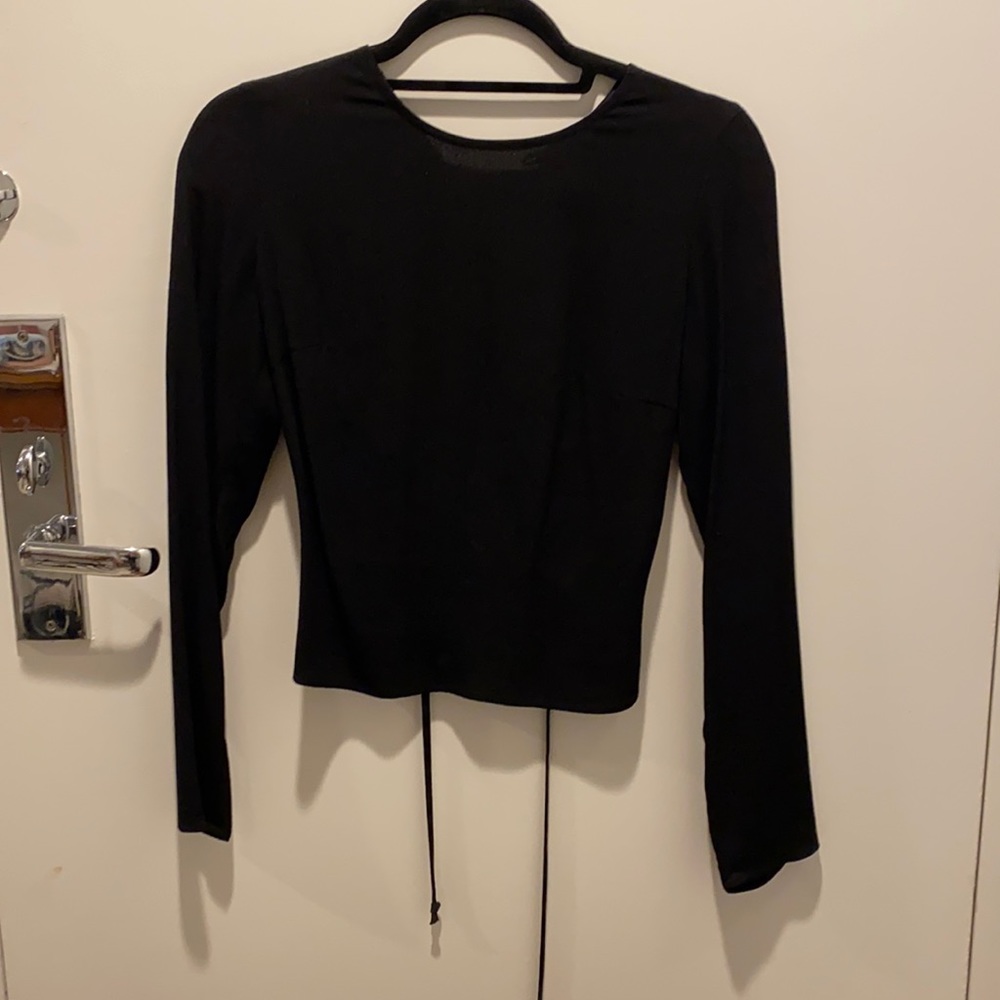 Long sleeved open back reformation blouse